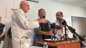 Pam Matteson, 66, a patient at South County Hospital, joins two doctors raising concerns about the hospital's management at a news conference on Sept. 12, 2024.