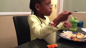 Nya at the dining room table