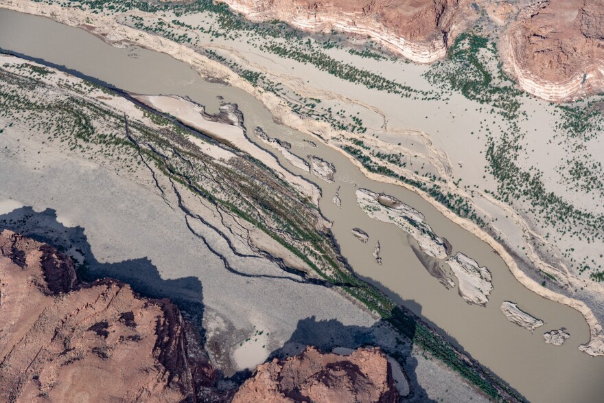 An aerial view of a small brown water filled Colorado River