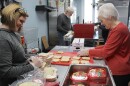 Volunteers in the Hunger and Health Coalition Food Recovery Kitchen help make sandwiches to be included in meals distributed to clients.