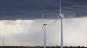 FILE - This Sept. 27, 2012 file photo, shows electricity-generating wind turbines in a corn field just outside Carlock, Ill. (AP Photo/David Mercer,File)