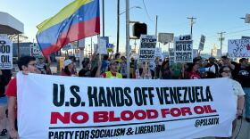 Protestors with the Party of Socialism and Liberation gathered at San Pedro and Basse Road on Saturday.