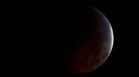 A total lunar eclipse will darken the skies over Indiana on Sept. 27.