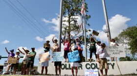 Between 1,200 and 2,000 people participated in a rally at the Collier County Courthouse in Naples on Saturday as part of a nationwide Hands Off protest.