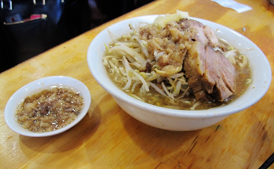 There are two choices at Yume Wo Katare: ramen topped with pork ($12), or ramen topped with more pork ($14). Extra garlic and fat can be added, too.