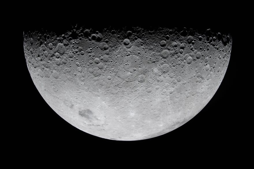 In this image provided by NASA, the Artemis II crew photographed the Moon's crater on Monday, April 6, 2026. (NASA via AP)