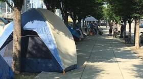 Members of Cincinnati's homeless community were allowed to set up their tents again Friday after the area along Third Street was cleaned.
