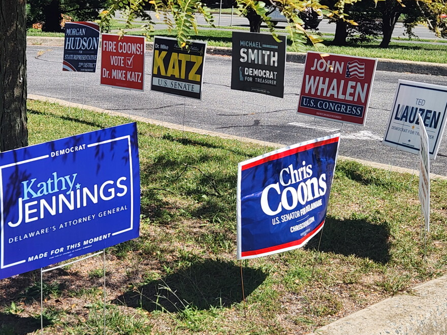 Signs for Democratic and Republican candidates at a Kent County polling location, September 15, 2026.