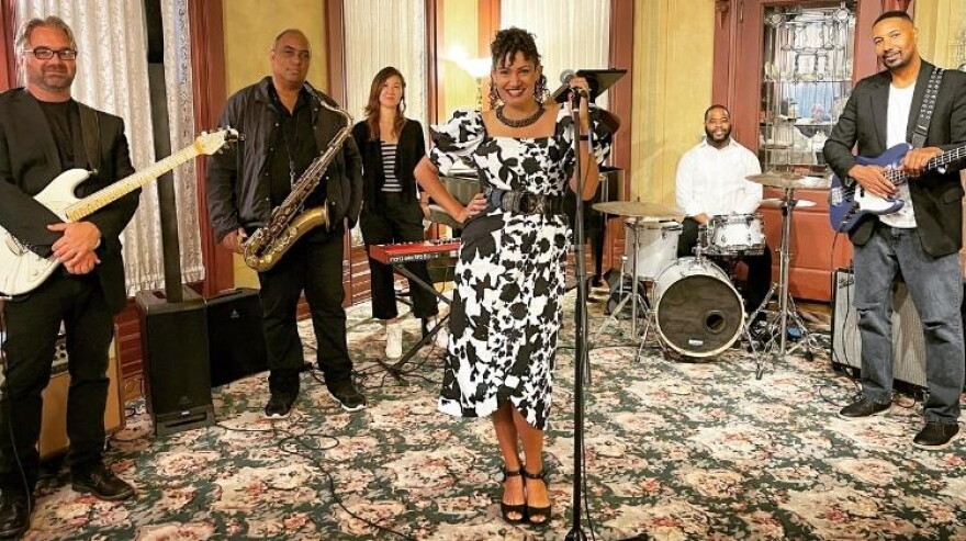 Vocalist Teresa Reynolds and her band. Reynolds is an organizer of the For The Culture Fest.