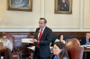 New Hampshire Attorney General John Formella speaks at an Executive Council meeting on Wednesday, March 25, 2026, as Gov. Kelly Ayotte looks on. (Concord Monitor photo)