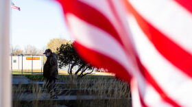 Man stands outside voting site