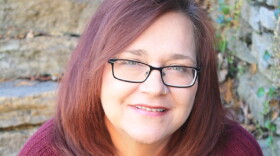 Anita Dowd, who has profound hearing loss, has worked for the Kentucky Commission on the Deaf and Hard of Hearing for 25 years.