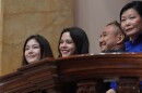 From left, Keiko Fujimori's daughters Kiara Villanella and Kaori Villanella, and her siblings Hiro Fujimori and Sachi Fujimori sit at Congress ahead of her inauguration in Lima, Peru, Tuesday, July 28, 2026.