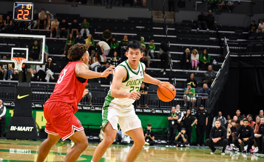 Oregon guard Lin Wei goes head-to-head with Seattle U defender Tyler Boston at an exhibition game on Oct. 15, 2026. Oregon lost the game 71-65.