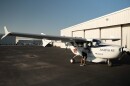 Ampaire's hybrid plane, EEL, sits outside a hangar.