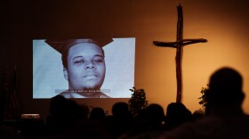 Community members watch a video interview with Michael Brown Jr.’s father Michael Brown Sr. and his wife Cal Brown on Wednesday, Aug. 7, 2024, during the “Ferguson and Beyond: A Community Conversation 10 Years Later” panel at Greater St. Mark Family Church in unincorporated north St. Louis County.