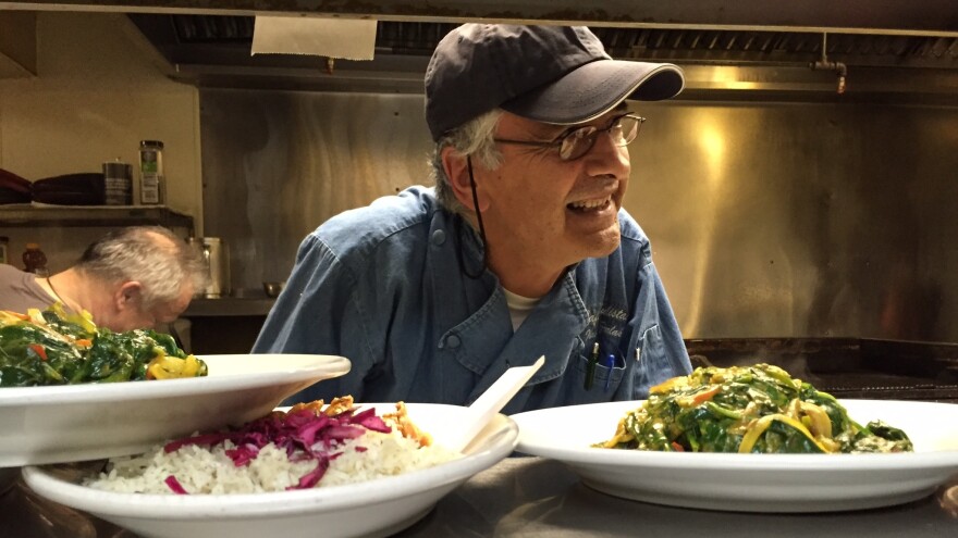 Ibraihm Parlak behind the counter at his restaurant. A U.S. congressman and a former Senator introduced private legislation that have allowed him to avoid deportation for the past decade. But his latest deferral expires this month.