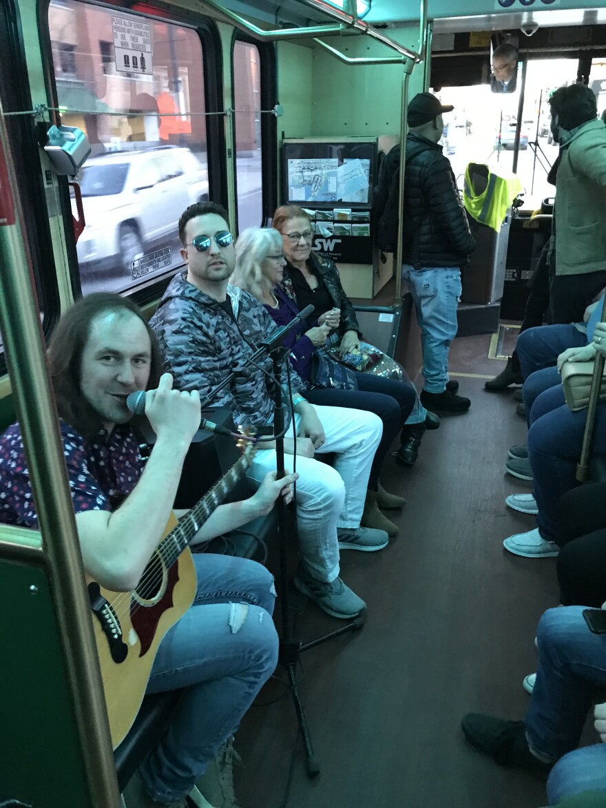 Shane Nelson performs on the DTA Trolley