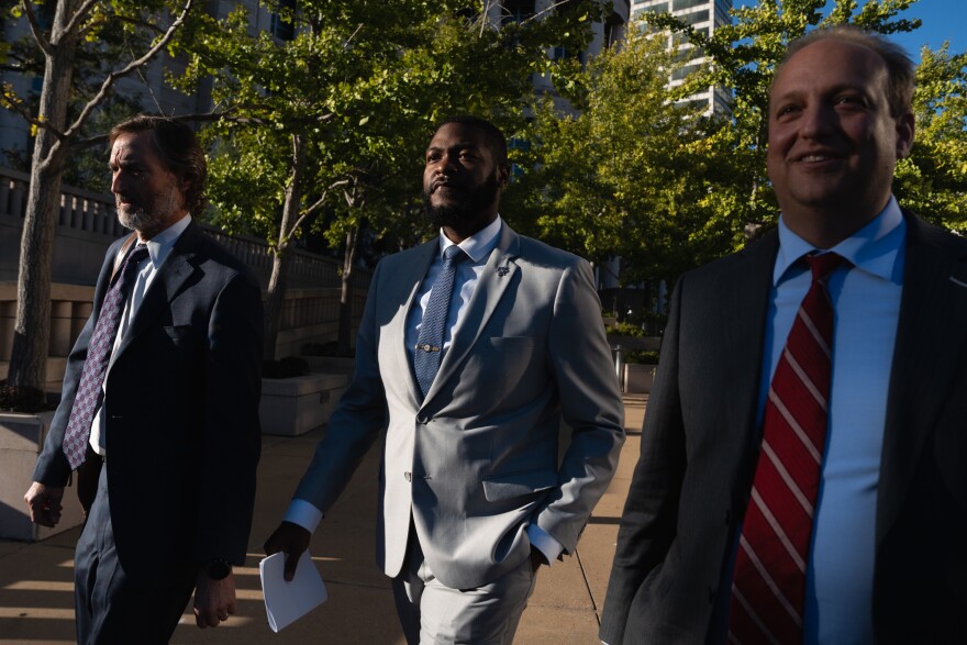 St. Louis Sheriff Alfred Montgomery, center, walks alongside his lawyers Bill Margolis, left, and Justin Gelfand, right, after being indicted on five federal felonies outside the Thomas F. Eagleton U.S. Courthouse on Thursday, Oct. 9, 2025, in downtown St. Louis.