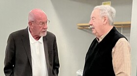 Tazewell County Auditor William Funkhouser, left, and county board member Nick Graff chat before Wednesday's board meeting.