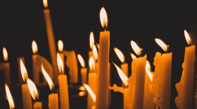 A group of lit candles 