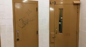 Jailhouse graffiti is common in the Mason County Jail which opened in 1985. CREDIT: Austin Jenkins/N3