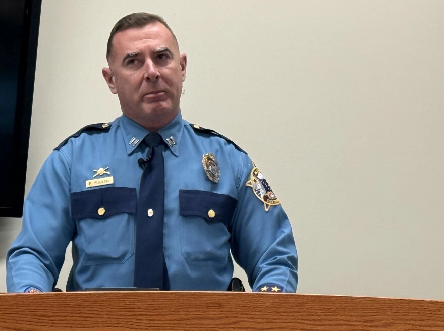 Capt. Tony Wegrzyn, commander of the Alaska Bureau of Investigation, speaks to reporters during a media availability at the Alaska State Troopers post Nov. 24, 2025, in Fairbanks, Alaska. Wegrzyn said the bureau is funneling resources to the area to help investigate multiple violent crimes that have happened recently in and around Fairbanks.