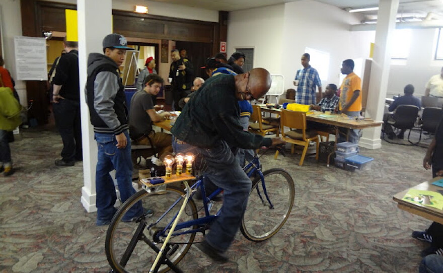 Discotech visitors learn about altnerative energy at this bike station