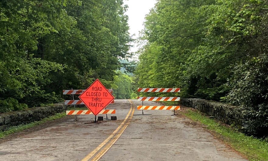 Image shows signs on the Blue Ridge Parkway showing the road is closed
