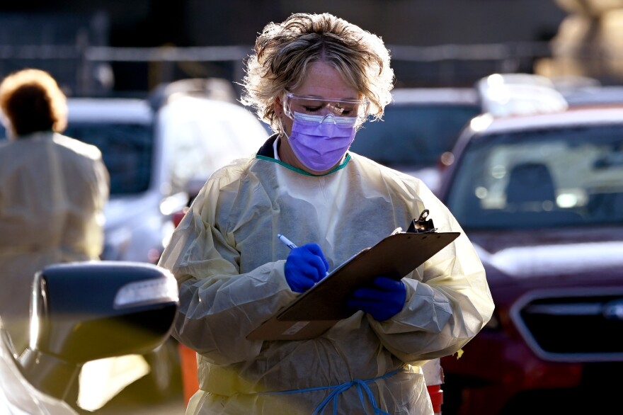 Clinical staff members coronavirus drive-through test