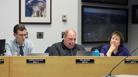 From left, Soldotna City Council members Jordan Chilson, Dan Nelson and Linda Farnsworth-Hutchings listen to public testimony about a rezone petition on Wednesday, Sept. 12, 2024 in Soldotna, Alaska.