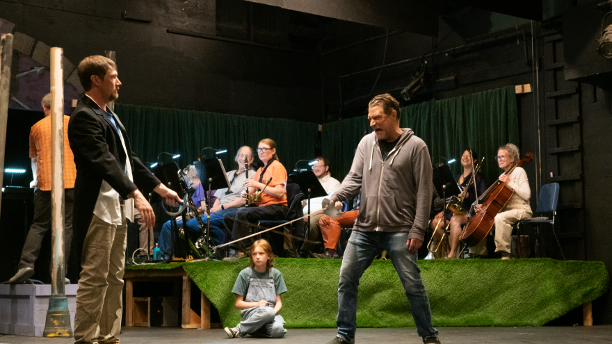 Michael Selle (right) rehearsing a scene with swords for "The Addams Family" on July 3, 2024.