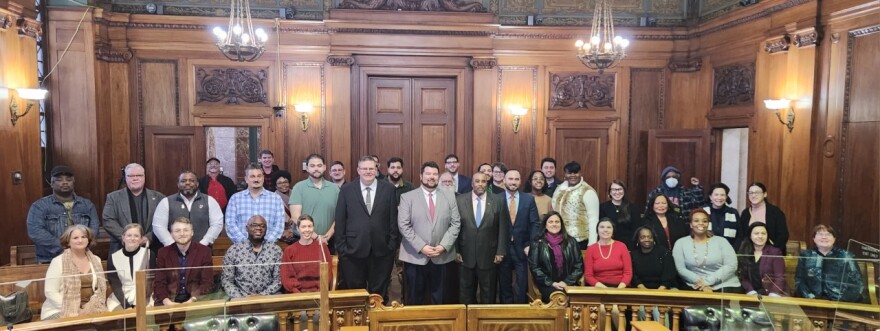 Springfield City Council President Jesse Lederman ( center wearing gray coat) and some of the appointees to four working groups he created to look into policy issues. Also in the picture are three of the four City Councilors who will chair the ad-hoc groups: City Councilor Sean Curran, to the left of Lederman, and City Councilors Melvin Edwards and Mike Fenton, who are standing to the right of Lederman. The fourth councilor, Zaida Govan, was not present when the photo was taken.