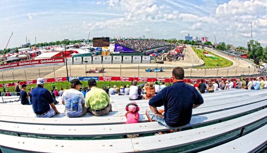 Spectators watching a car race