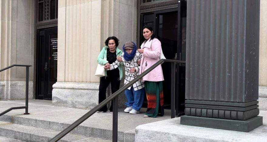 Kim Phuong Taylor (on the right) leaves the Federal Courthouse in Sioux City on Monday Nov. 20 when jury deliberations got underway.