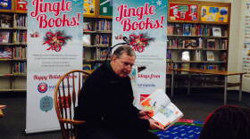 Indianapolis Mayor Greg Ballard reads the Dr. Seuss book "Green Eggs and Ham" to children at Indianapolis Public Library's Eagle Branch on Tuesday, Dec. 16, 2014.