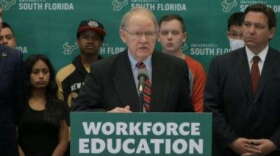 Executive Director of Cyber Florida, Mike McConnell, speaks at a press conference about new state cybersecurity funding. Florida Governor's Office. (Violet Comber-Wilen/WUSF)