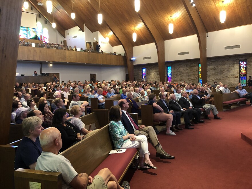 Supporters of St. George gather inside Woodlawn Baptist Church in early September 2019.