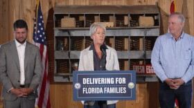 Robin Safley, CEO of Feeding Florida, talked about the delivery of 5.67 million Grade A eggs to food banks and pantries serving every county in the state. The eggs are Florida’s share of a nationwide settlement that returns a breakfast staple to families who felt rising prices at the checkout line. Safley joined Florida Attorney General James Uthmeier, left, and Florida Commissioner of Agriculture Wilton Simpson, right, to announce the settlement Wednesday.