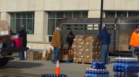 Volunteers work to distribute items during a Ruby's Pantry event at the Bemidji Sanford Center on March 19, 2026.