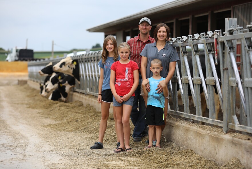 Travis Clark and Janet Clark are pictured with their three children, from left, Grace, 13, Eve, 10, and Levi, 6, at Vision Aire Farms.