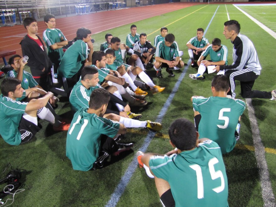 Members of the YALLA Soccer Club at a recent scrimmage match in El Cajon. The club provides soccer training to refugee children and teens on the condition they participate in weekly tutoring.