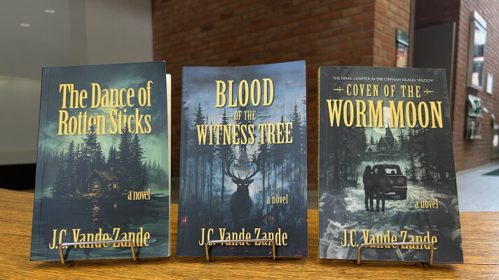 All three books in the Orphan Island trilogy written by J.C. Vande Zande