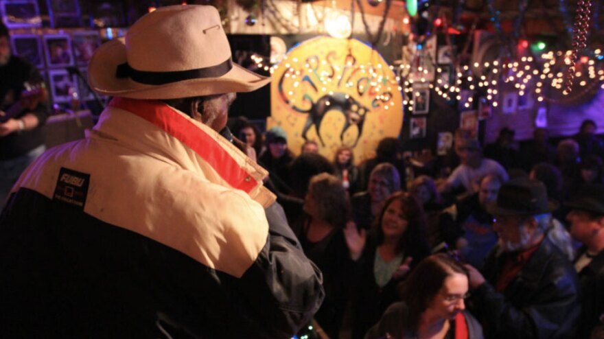 Owner Henry Gipson (aka Mr. Gip) addresses the crowd at Gip's Place in Bessemer, Ala.
