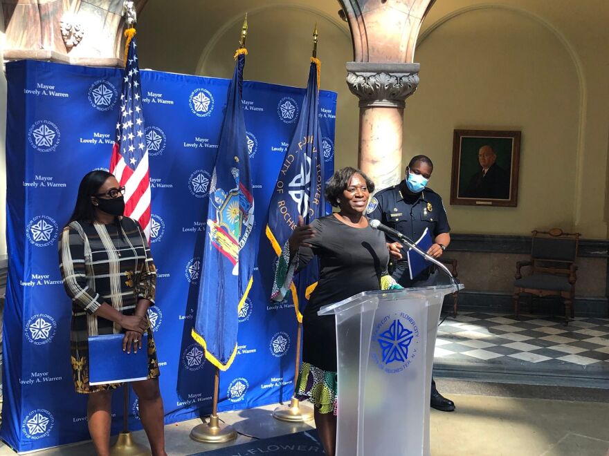 Mayor Lovely Warren, Reverend Myra Brown (at the podium) and Chief La'Ron Singletary at City Hall on Sunday.