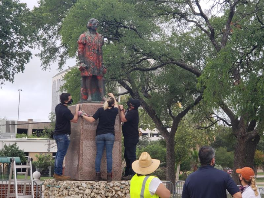 The crowd gather about two hours before the statue was removed.