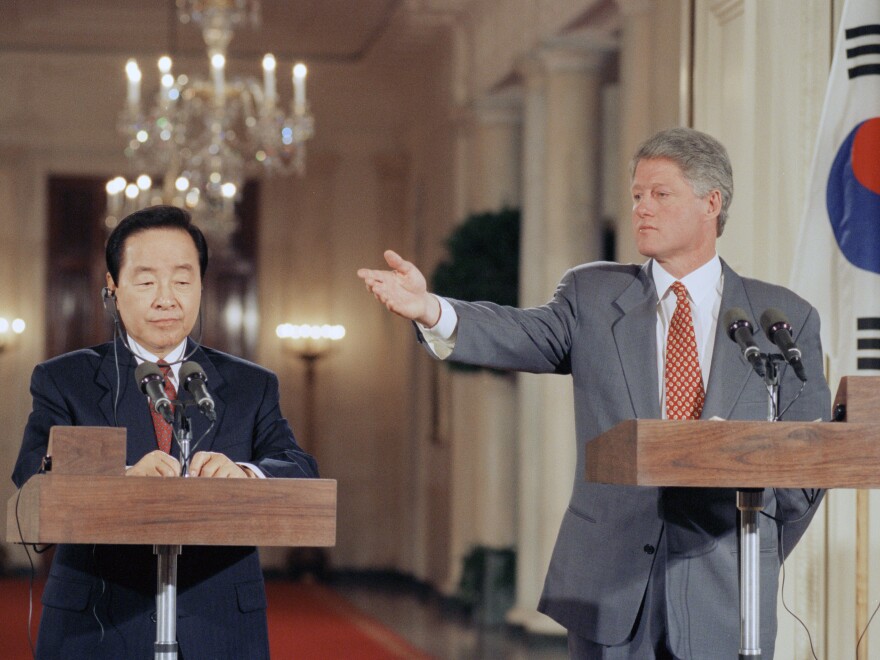 Former President Bill Clinton gestures during a joint news conference with then-South Korean President Kim Young-sam in the White House in 1993. At the time, Clinton said that the U.S. was ready to resolve "once and for all" its differences with North Korea if the communist regime resumed talks with South Korea and allowed outside inspections of its nuclear program.
