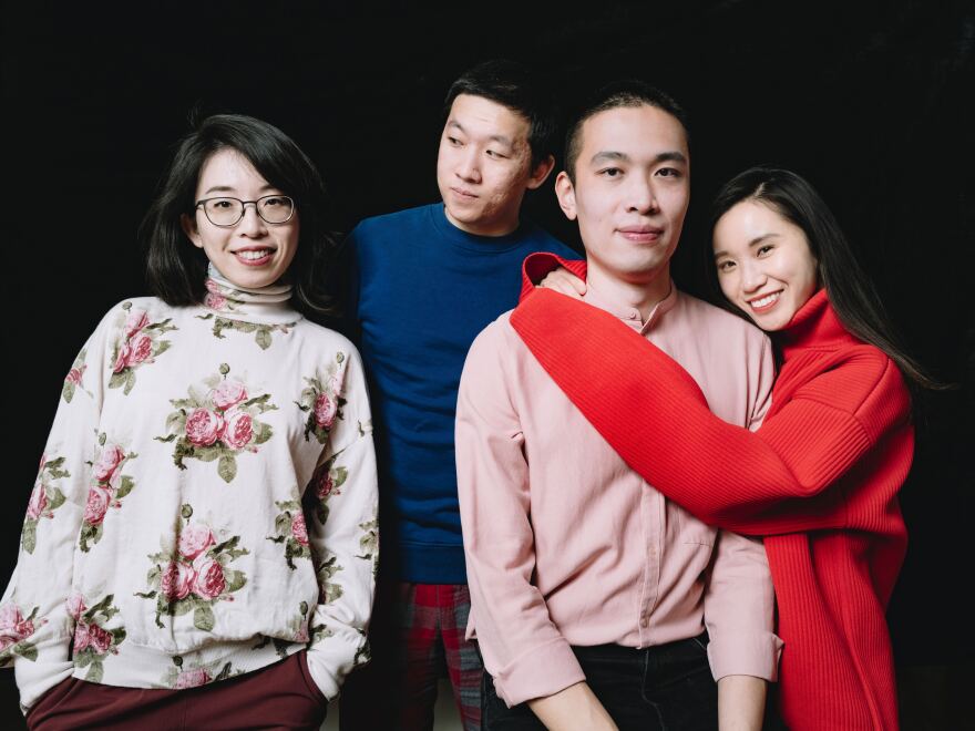 Wanyu Zhang, left, and her friends have a photo shoot to ring in the new year.