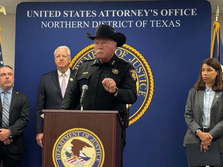 A man standing in front of a podium.