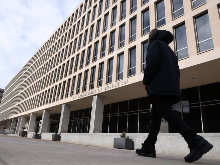 A man walks past the U.S. Department of Education building in Washington, D.C., on Feb. 7.